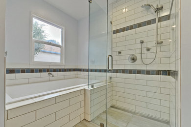 Bathroom - large transitional master blue tile, brown tile, multicolored tile, white tile and subway tile porcelain tile bathroom idea in San Francisco with shaker cabinets, dark wood cabinets, a two-piece toilet, quartz countertops, gray walls and a trough sink