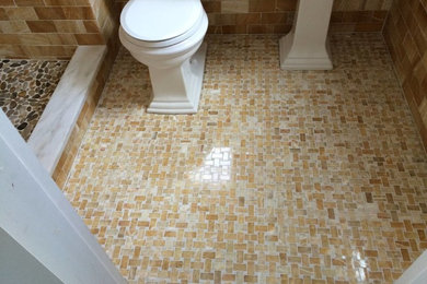 Bathroom - pebble tile floor bathroom idea in New York