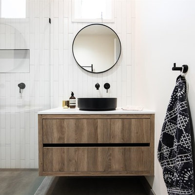 Inspiration for a mid-sized contemporary master white tile and ceramic tile porcelain tile bathroom remodel in Melbourne with white walls, quartz countertops, white countertops, flat-panel cabinets, medium tone wood cabinets and a wall-mount sink