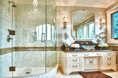 Inspiration for a victorian mosaic tile bathroom remodel in Calgary with a vessel sink