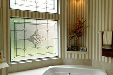 Example of a classic bathroom design in Denver with beige walls