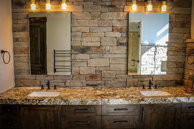Mountain style bathroom photo in Salt Lake City with granite countertops