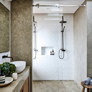 Inspiration for a contemporary 3/4 bathroom in Sydney with dark wood cabinets, an alcove shower, white tile, a vessel sink, brown floor, a sliding shower screen, brown benchtops, a niche, a built-in vanity and recessed.