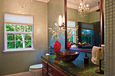 Bathroom - mid-sized eclectic bathroom idea in Atlanta with brown cabinets, a one-piece toilet and a vessel sink
