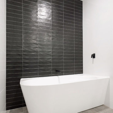 Bathroom with Black Tile Feature Wall