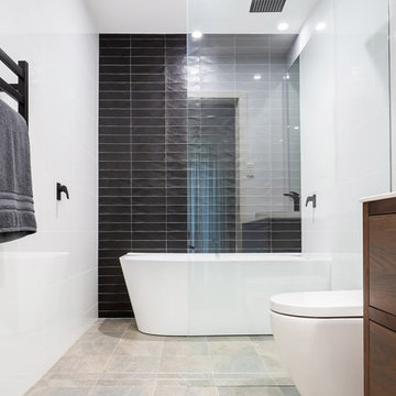 Bathroom with Black Tile Feature Wall