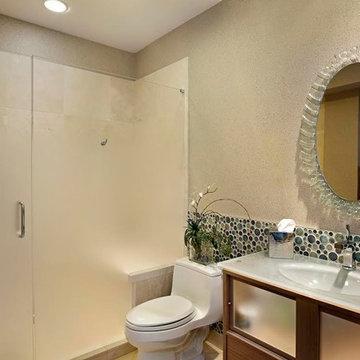 Bathroom with Circular Tile Backsplash and Statement Mirror