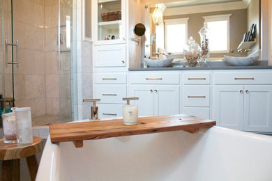 Inspiration for a mid-sized contemporary master bathroom remodel in Oklahoma City with a vessel sink, shaker cabinets, white cabinets, quartz countertops and beige walls