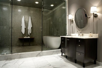 Example of a large trendy master marble floor double shower design in Other with a drop-in sink, flat-panel cabinets, dark wood cabinets, marble countertops and gray walls