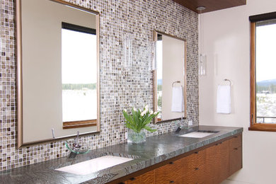Bathroom - contemporary gray tile and mosaic tile bathroom idea in Portland with flat-panel cabinets and medium tone wood cabinets