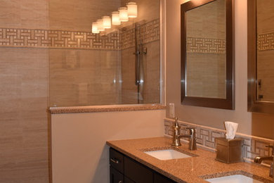 Mid-sized trendy 3/4 beige tile, brown tile and ceramic tile open shower photo in Chicago with flat-panel cabinets, black cabinets, beige walls, an undermount sink and granite countertops