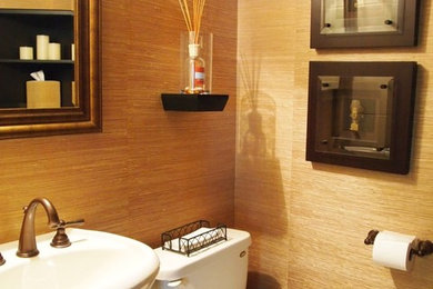 Mid-sized 3/4 medium tone wood floor bathroom photo in Chicago with a pedestal sink, a two-piece toilet and beige walls