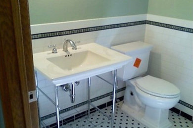 Inspiration for a white tile and glass tile bathroom remodel in Other with a two-piece toilet