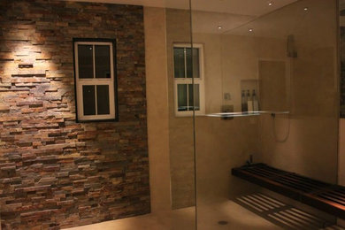Inspiration for a stone tile bathroom remodel in San Diego