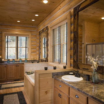Bathrooms in rustic round log home