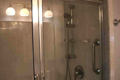 Bathroom - small beige tile bathroom idea in Providence with beige walls