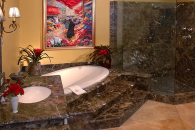 Elegant bathroom photo in Santa Barbara with an undermount sink and beige walls
