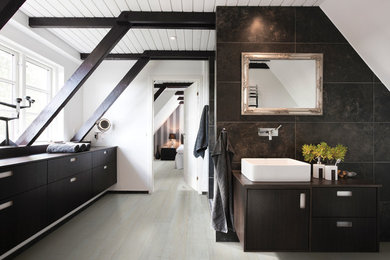 Inspiration for a large contemporary master brown tile vinyl floor and beige floor bathroom remodel in Other with a vessel sink, flat-panel cabinets, dark wood cabinets, wood countertops and white walls