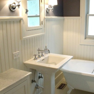 Design ideas for a mid-sized traditional 3/4 bathroom in Chicago with shaker cabinets, white cabinets, a claw-foot tub, purple walls, mosaic tile floors, a pedestal sink and solid surface benchtops.