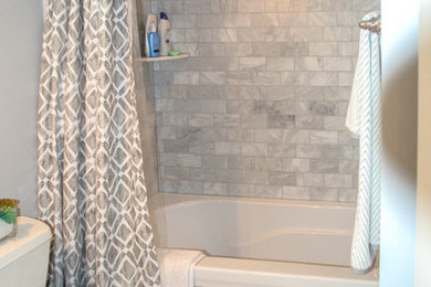 Alcove bathtub - small modern kids' gray tile and stone tile porcelain tile alcove bathtub idea in Louisville with a two-piece toilet and gray walls