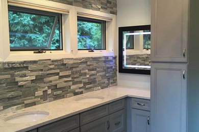 Large transitional master beige tile and ceramic tile dark wood floor bathroom photo in Other with an undermount sink, gray cabinets and white walls