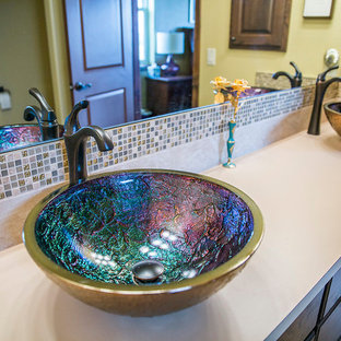 Inspiration for a mid-sized eclectic master bathroom in Denver with a vessel sink, flat-panel cabinets, medium wood cabinets, laminate benchtops, beige tile, ceramic tile, beige walls and ceramic floors.