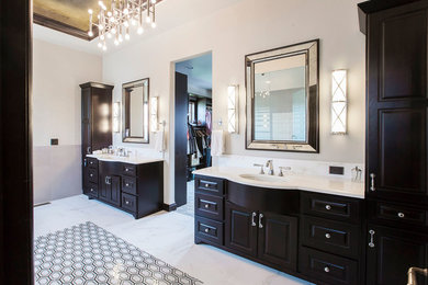 Inspiration for an expansive mediterranean ensuite bathroom in Denver with freestanding cabinets, black cabinets, white walls, marble flooring, a built-in sink, quartz worktops, multi-coloured floors and white worktops.