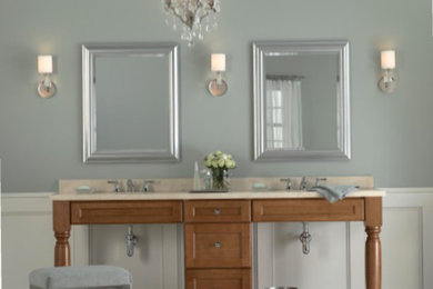 Example of a transitional master bathroom design in Milwaukee with blue walls