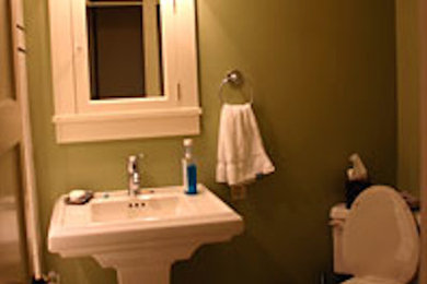 Inspiration for a white tile bathroom remodel in Portland with green walls