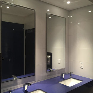 Large minimalist white tile bathroom photo in Chicago with open cabinets, purple cabinets, a two-piece toilet, white walls, an undermount sink and laminate countertops