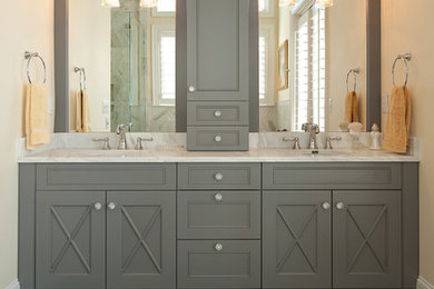 Bathroom - large transitional master dark wood floor bathroom idea in Charleston with beige walls, an undermount sink, beaded inset cabinets, gray cabinets and marble countertops
