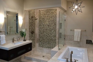 This is an example of a medium sized contemporary ensuite half tiled bathroom in Denver with freestanding cabinets, dark wood cabinets, a built-in bath, a corner shower, beige tiles, ceramic tiles, beige walls, ceramic flooring, a submerged sink, marble worktops, an open shower, white worktops, a shower bench and a single sink.