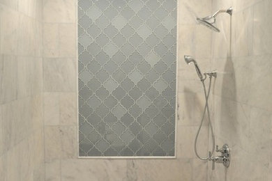 Mid-sized transitional master gray tile and glass tile porcelain tile bathroom photo in New York with marble countertops, furniture-like cabinets, dark wood cabinets, a one-piece toilet, beige walls and an undermount sink