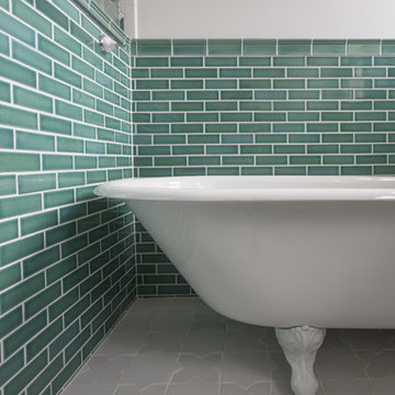 Bathtub surrounded by 2x6 tiles in Sea Foam.