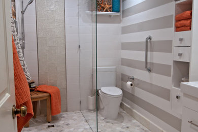 Inspiration for a small modern bathroom in Los Angeles with flat-panel cabinets, white cabinets, a two-piece toilet, white tiles, ceramic tiles, marble flooring, white floors, an open shower and white worktops.