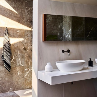 Design ideas for a mid-sized contemporary master bathroom in Brisbane with a curbless shower, beige tile, brown tile, beige walls, a vessel sink, brown floor, an open shower and white benchtops.
