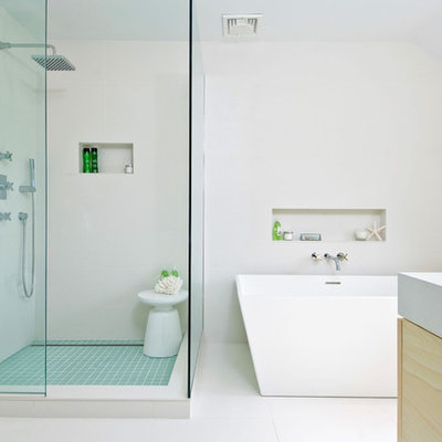 Freestanding bathtub - contemporary freestanding bathtub idea in New York with white countertops
