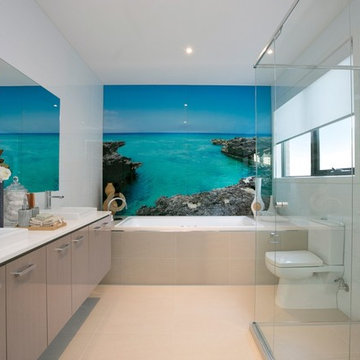 Beachside, picture glass splash-back to bath in Ensuite