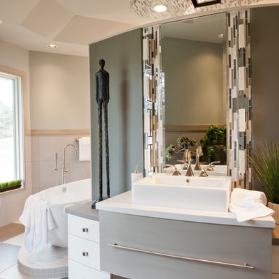 Inspiration for a contemporary freestanding bathtub remodel in St Louis with a vessel sink