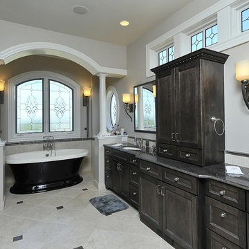 Beautiful cabinetry carries into the luxurious master bath