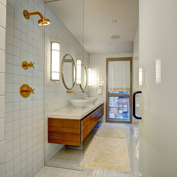 White Bathroom with Brass Accents