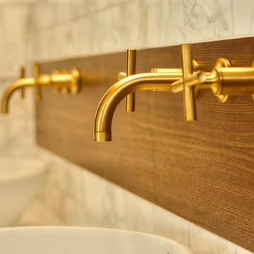 Vessel Sink with Brass Faucets and Floating Wood Details