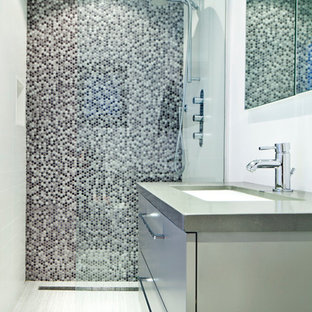 Design ideas for a small modern 3/4 bathroom in Toronto with flat-panel cabinets, grey cabinets, a curbless shower, black tile, black and white tile, gray tile, white tile, mosaic tile, white walls, ceramic floors, an undermount sink and zinc benchtops.
