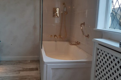 Contemporary family bathroom in Kent with a built-in bath.