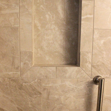 Beige Tiled Shower and Free Standing Vanity with Quartz Countertop