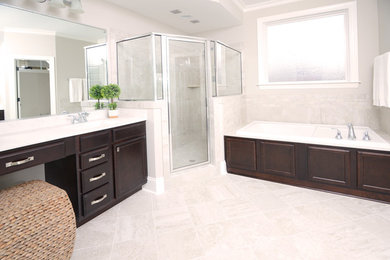 Large elegant master gray tile and porcelain tile marble floor bathroom photo in Louisville with an integrated sink, flat-panel cabinets, brown cabinets, marble countertops, a one-piece toilet and gray walls