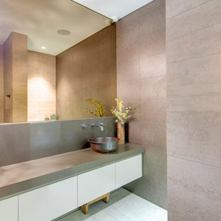 Contemporary bathroom in Sydney with flat-panel cabinets, white cabinets, gray tile, a vessel sink, grey floor and grey benchtops.