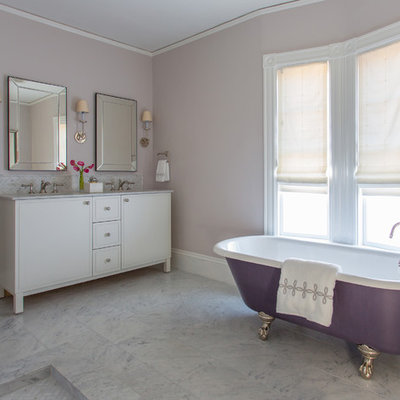 Mid-sized transitional master white tile claw-foot bathtub photo in Boston with white cabinets, marble countertops, flat-panel cabinets, purple walls and an undermount sink