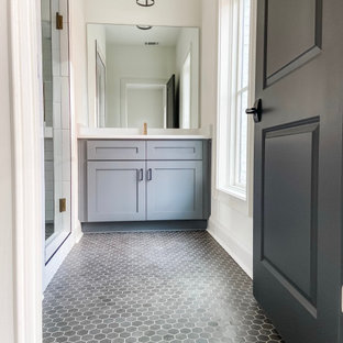 Design ideas for a mid-sized transitional 3/4 bathroom in Atlanta with shaker cabinets, grey cabinets, a double shower, a one-piece toilet, white tile, subway tile, white walls, mosaic tile floors, a drop-in sink, engineered quartz benchtops, grey floor, a hinged shower door, white benchtops, a single vanity, a built-in vanity and brick walls.