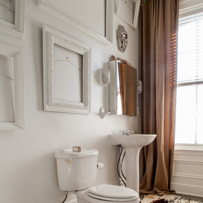 Inspiration for an eclectic brown tile bathroom remodel in Other with a pedestal sink and a two-piece toilet